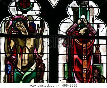 Poissy France - august 6 2016 : stained glass window of the historical collegiate church where the king Saint Louis was baptised
