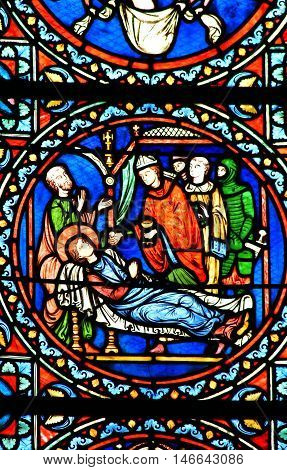 Poissy France - august 6 2016 : stained glass window of the historical collegiate church where the king Saint Louis was baptised