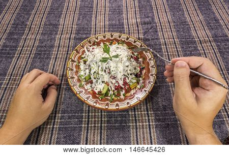 Eating Traditional Shopska Salad