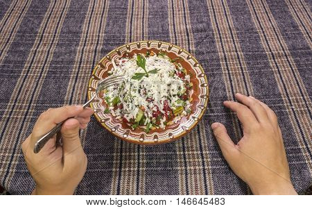 Eating Traditional Shopska Salad