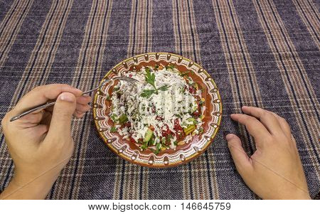 Eating Traditional Shopska Salad