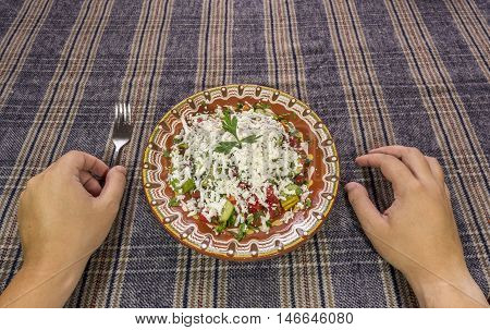 Eating Traditional Shopska Salad