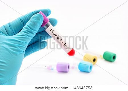 Test tube with blood sample for H.pylori bacteria test