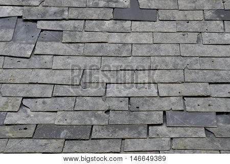 Esteville France - june 23 2016 : damaged slate roof