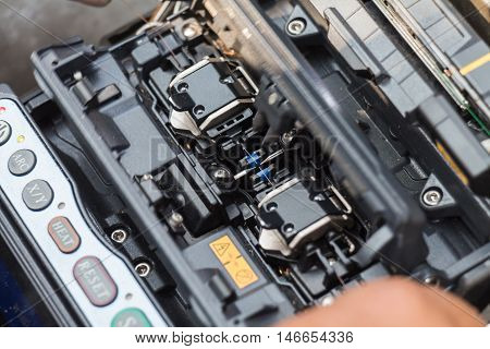 working with fiber optic fusion splicer tools