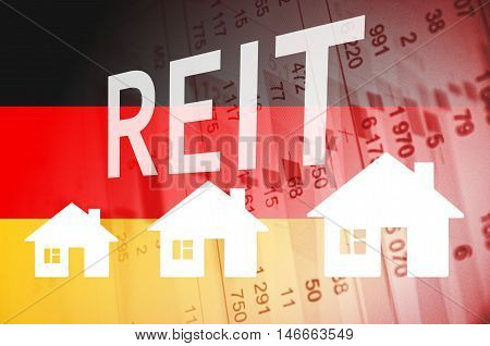 Inscription REIT and house icons on PC screen. Positive Trend in Germany Property Market.