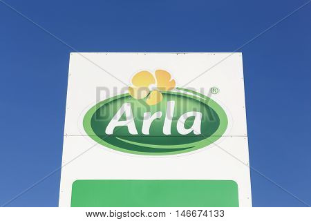 Taulov, Denmark - September 10, 2015: Arla Foods logo on a panel. Arla Foods is an international cooperative based in Aarhus, Denmark, and the largest producer of dairy products in Scandinavia