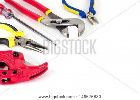 Hand tools set screwdriver clippers Pipe wrench pliers.
