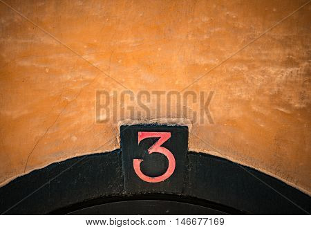 House number sign. Details of Gamla Stan architecture. 