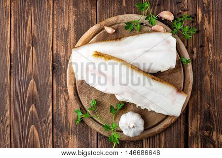 fresh pork fat lard on wooden table