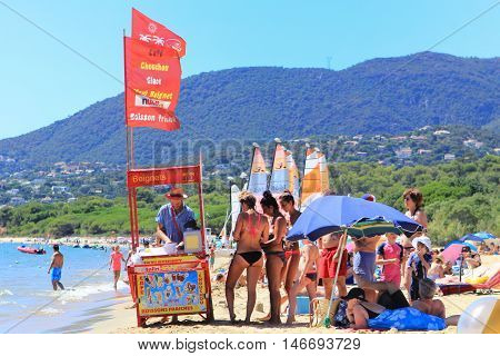La Croix Valmer, Provence, France - August 23 2016: Beach Vendor Selling Ice Cream, Donuts (beignet)