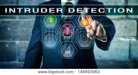 Security manager is pressing INTRUDER DETECTION on an interactive command screen. Concept for computer and information security procedure aimed at identifying a unauthorized network intruder.