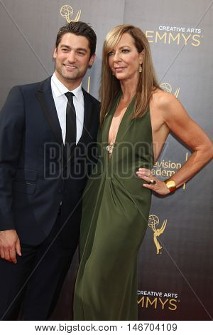 LOS ANGELES - SEP 10:  Philip Joncas, Allison Janney at the 2016 Creative Arts Emmy Awards - Day 1 - Arrivals at the Microsoft Theater on September 10, 2016 in Los Angeles, CA
