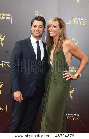 LOS ANGELES - SEP 10:  Philip Joncas, Allison Janney at the 2016 Creative Arts Emmy Awards - Day 1 - Arrivals at the Microsoft Theater on September 10, 2016 in Los Angeles, CA