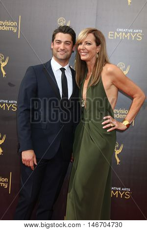 LOS ANGELES - SEP 10:  Philip Joncas, Allison Janney at the 2016 Creative Arts Emmy Awards - Day 1 - Arrivals at the Microsoft Theater on September 10, 2016 in Los Angeles, CA