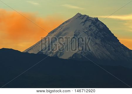Kamen volcano on the background of sunrise. Kluchevskaya group of volcanoes