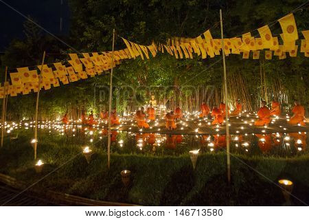 Chiang Mai, Thailand - May 20: Thai Buddhist Monks Meditate With .candle Lighting During The Religio