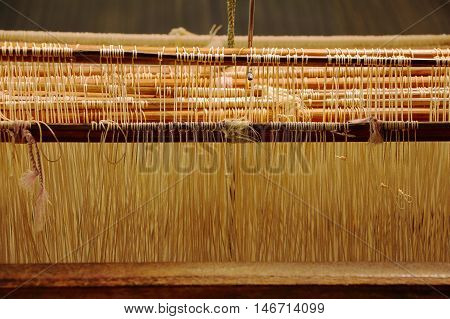 weaving loom for silk heddle is a component in a loom