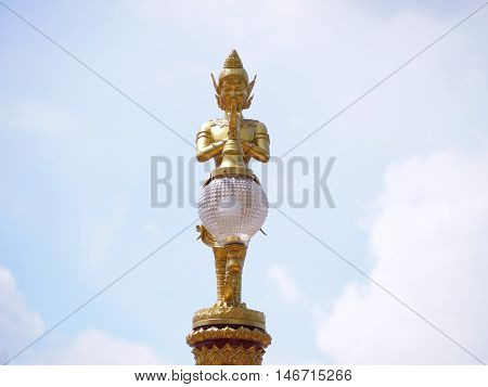 Thai style kinaree lamp post in temple