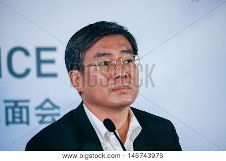 SHANGHAI CHINA - AUGUST 31 2016: Huawei Enterprise BG president Yan Lida at press-conference at Connect 2016 information technology conference and exhibition in Shanghai China on August 31 2016.