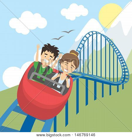 Rollercoaster in amusement park. Young smiling man and woman have fun on the roller coaster. Scary but funny entertainment.