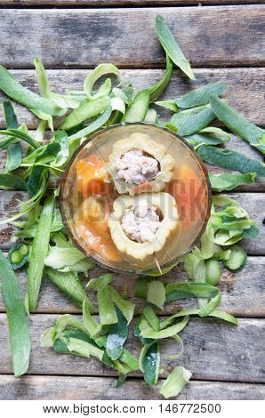 Boiled gourd stuffed with minced pork in glass bowl