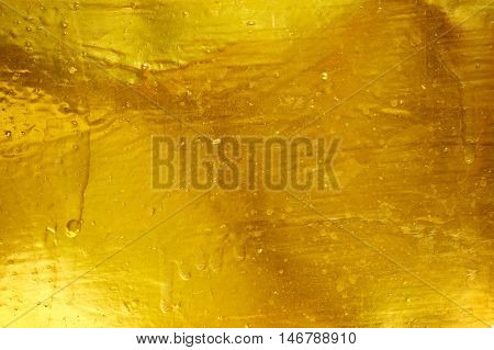 Dark gold polished metal texture for background