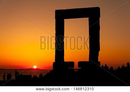 Portara of Naxos famous landmark of greece at sunset