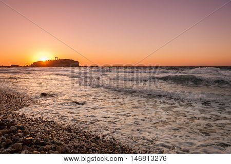 Portara of Naxos famous landmark of greece at sunset