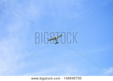 A Small Single-engine Plane In The Sky
