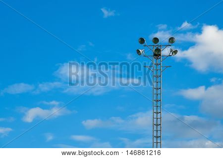 Spot light for stadium with blue sky background