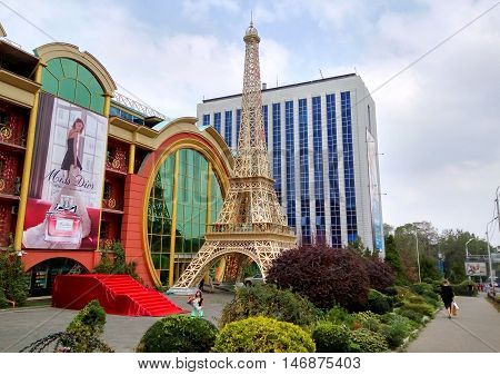 ALMATY KAZAKHSTAN - SEPTEMBER 12 2016: Reduced copy of Eiffel Tower on the street Furmanova. Almaty is the largest city in Kazakhstan and was the country's capital until 1997.