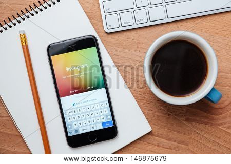 CHIANG MAI, THAILAND - JANUARY 02, 2015. Iphone 6s screen with Instagram app lying on the wooden table. Instagram is largest and most popular photograph social networking site in the world