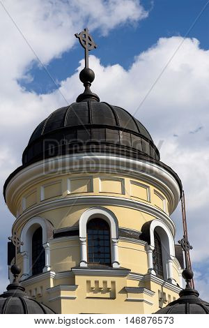Photo of Capriana Monastery in Moldova with blue sky