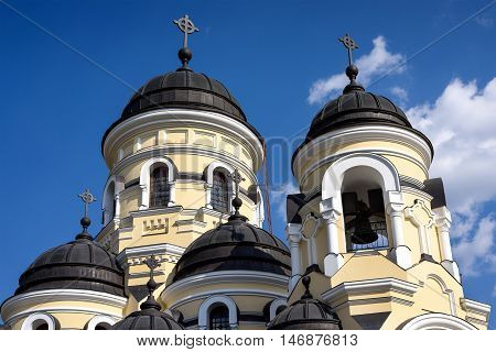 Photo of Capriana Monastery in Moldova with blue sky