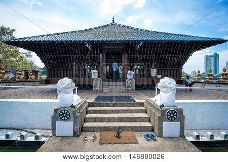 COLOMBO SRI LANKA - FEBRUARY 16 2016: The Seema Malaka Temple in Colombo is situated on Beira Lake and is part of the Gangaramaya Buddhist Temple Complex.