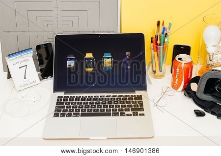PARIS FRANCE - SEP 8 2016: Apple Computers website on MacBook Retina in room environment showcasing live coverage of Apple Keynote - Apple COO Jeff Williams about new Apple Watch Series 2