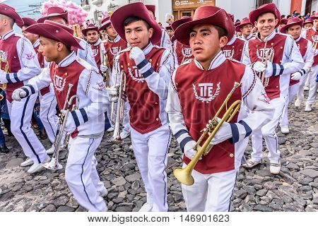 Antigua Guatemala - September 15 2015: Trumpet players march in street parade during Guatemalan Independence Day celebrations