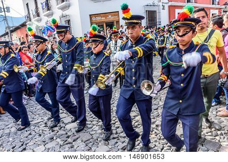 Antigua Guatemala - September 15 2015: Bands march in street parade during Guatemalan Independence Day celebrations