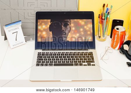 PARIS FRANCE - SEP 8 2016: Apple Computers website on MacBook Retina in room environment showcasing live coverage of Apple Keynote - presentation of iPhone new photo camera double camera