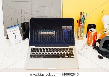 PARIS FRANCE - SEP 8 2016: Apple Computers website on MacBook Retina in room environment showcasing live coverage of Apple Keynote - Apple COO Jeff Williams on stage about waterproof apple watch