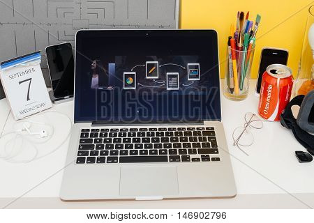 PARIS FRANCE - SEP 8 2016: Apple Computers website on MacBook Retina in room environment showcasing live coverage of Apple Keynote - iiWork suite eal-time collaboration for collaborative editing