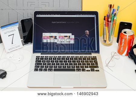 PARIS FRANCE - SEP 8 2016: Apple Computers website on MacBook Retina in room environment showcasing live coverage of Apple Keynote - Apple