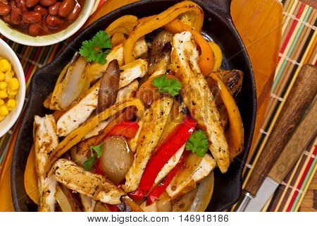 Chicken Fajitas with Grilled Onions and Bell Peppers. Selective focus.
