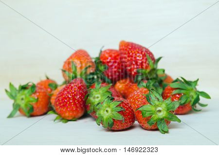 Group Of Of Red Ripe Strawberry Fruit On Wooden Board (also Known As Fragaria Strawberry, Fragaria A