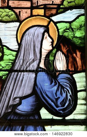 Saint Wandrille Rancon France - june 22 2016 : the stained glass window of Saint Michel church