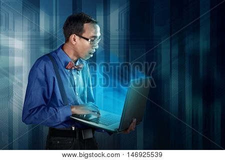 Nerdy Man Using Laptop