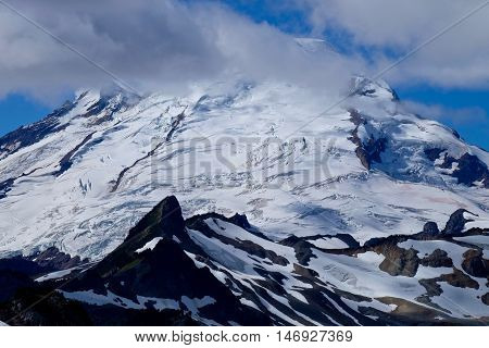 Icy top and crevasses  of Mount Baker in Cascade Mountains. Mount Baker National Forest. Bellingham. Washington. USA.