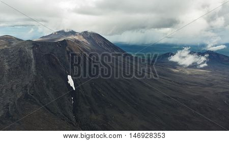 Maly Semyachik is a stratovolcano. Kronotsky Nature Reserve on Kamchatka Peninsula. View from helicopter.