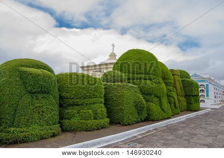 TULCAN, ECUADOR - JULY 3, 2016: nice trees sculptures located in the graveyard of the city.